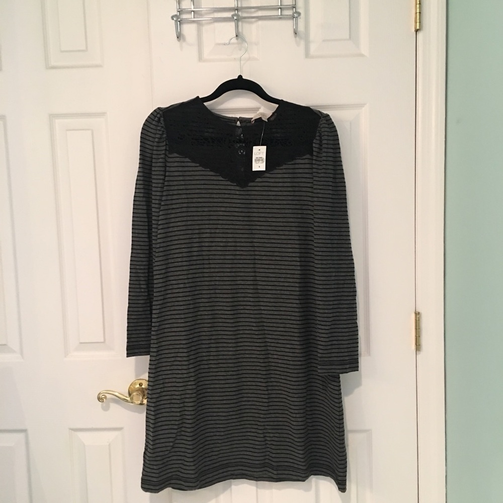 Long sleeve, just above the knee striped dress.